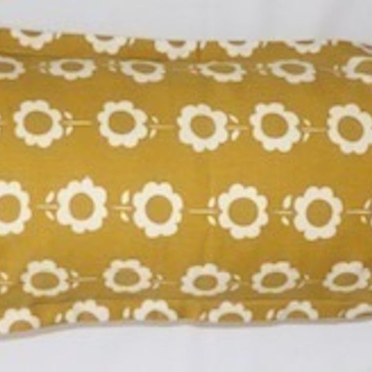 Daisychain mustard cushion cover