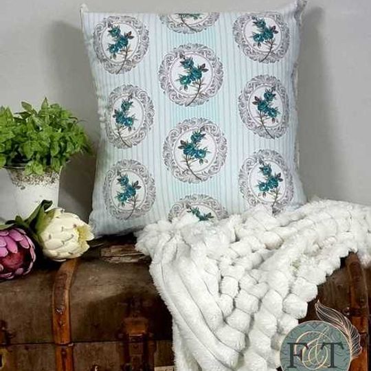 White and turquoise cushion